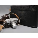 A Leica Wetzlar M2 - 1037 356 DBP camera with Summicron f=5cm 1:2 lens No. 1592327 and case of
