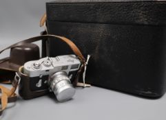 A Leica Wetzlar M2 - 1037 356 DBP camera with Summicron f=5cm 1:2 lens No. 1592327 and case of