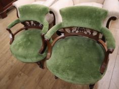 A pair of late Victorian upholstered tub chairs