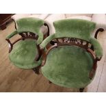 A pair of late Victorian upholstered tub chairs