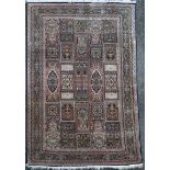 A Persian silk rug 184 x 123cm