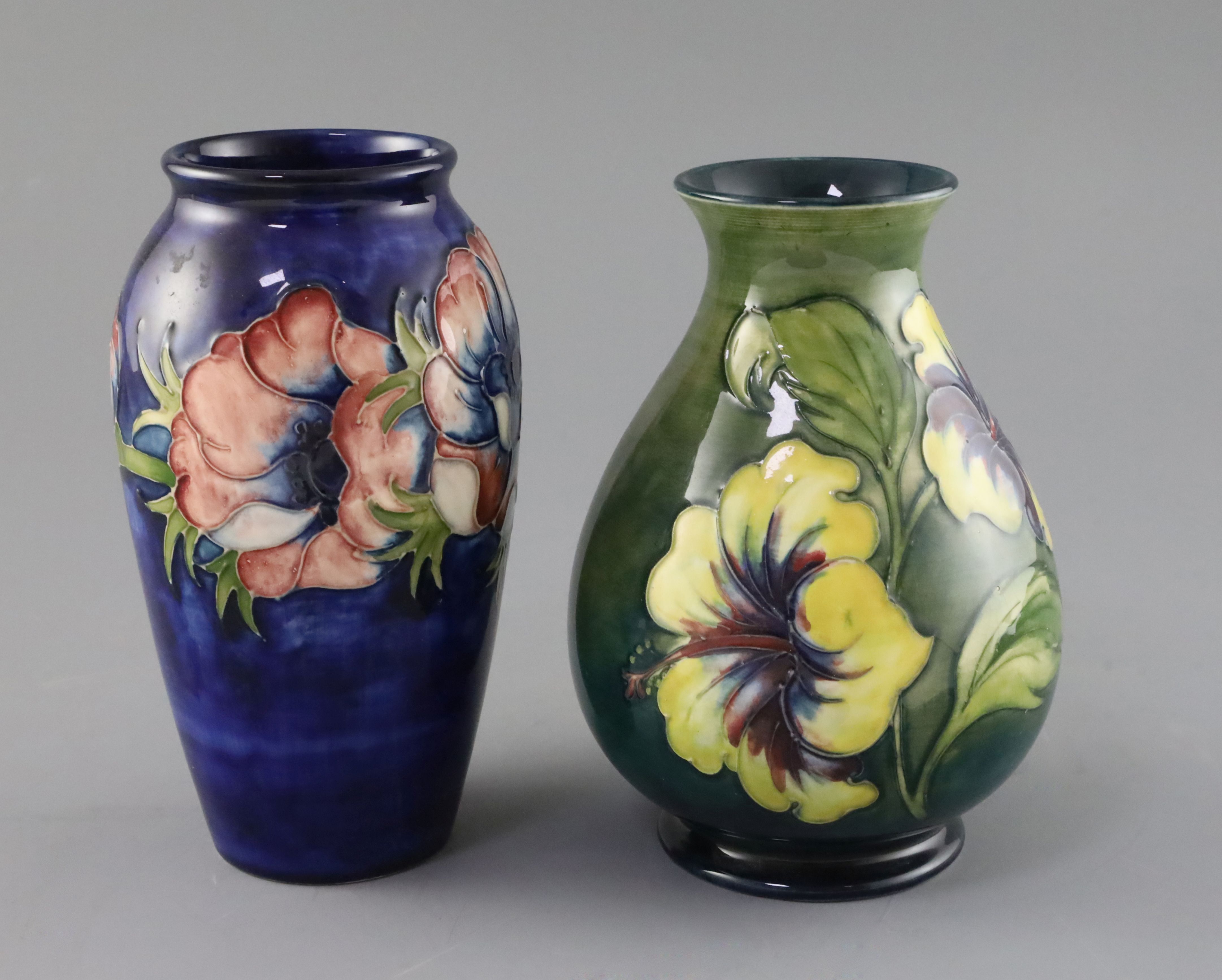 A Moorcroft 'anemone' vase and a similar 'hibiscus' vase, 1950/60's, impressed marks Moorcroft,