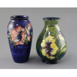 A Moorcroft 'anemone' vase and a similar 'hibiscus' vase, 1950/60's, impressed marks Moorcroft,