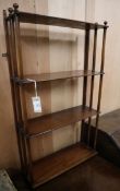 A Regency mahogany four tier wall shelf W.62cm