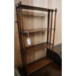 A Regency mahogany four tier wall shelf W.62cm