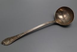 A late Victorian silver fancy pattern soup ladle, Henry Frazer,London 1893, 34cm, 10 oz.