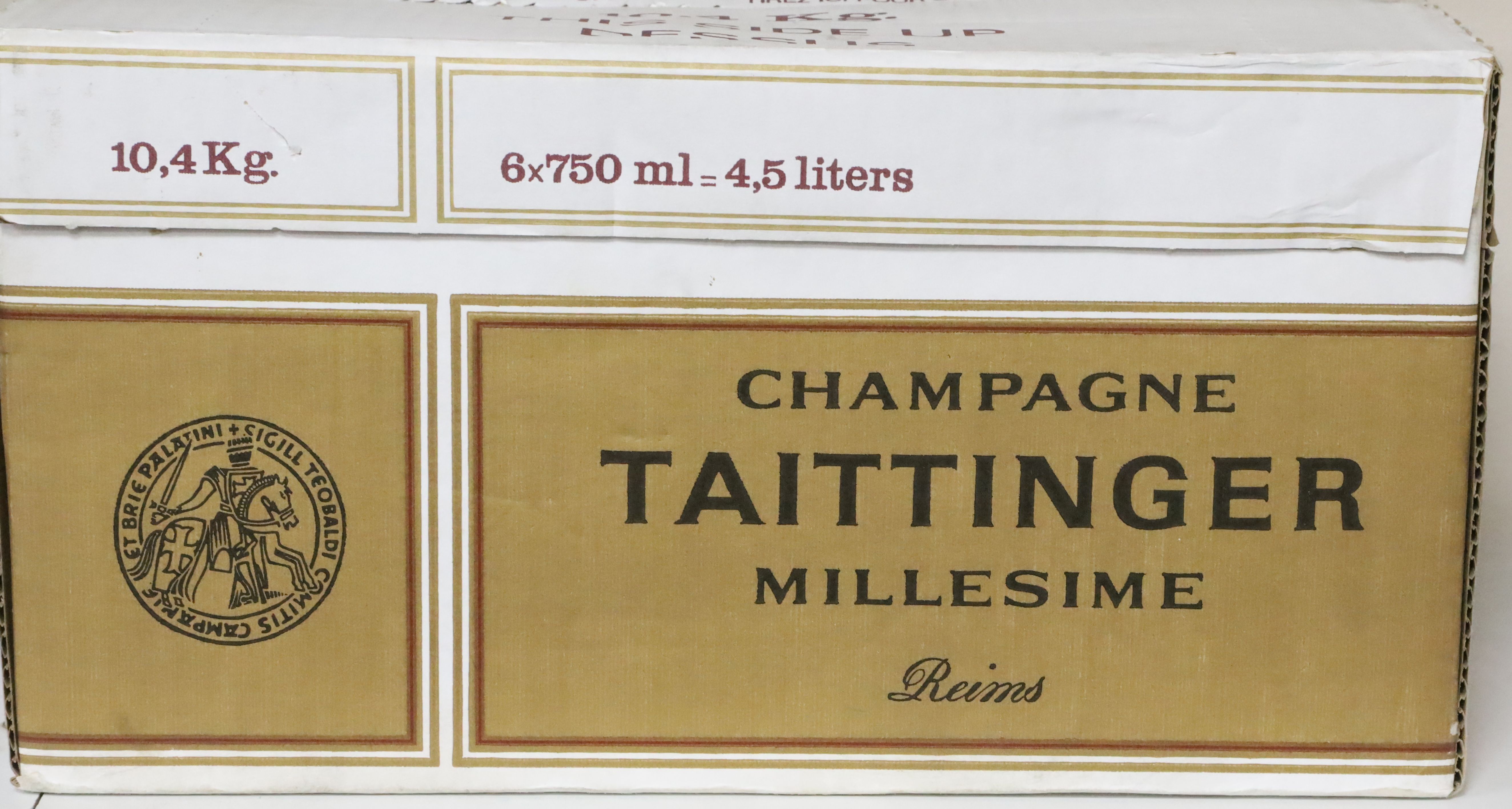 A box of six bottles of Tattinger 1/1 Brut Millesime, 1990 champagne