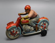 A Technofix clockwork tinplate motorcycle, c.1940