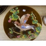 A pair of Schuz Cilli wall dishes, decorated with birds diameter 44cm