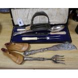 A pair of shoe trees, stirrups and plated servers etc