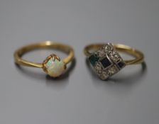An emerald, sapphire and diamond tablet ring on 18ct shank and an 18ct and white opal-set ring.