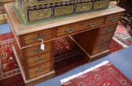 A late Victorian oak pedestal desk W.122cm