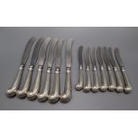 A set of six American Steiff Company Williamsburg Restoration sterling pistol handled table knives