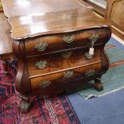 A Dutch figured walnut bombe commode W.84cm