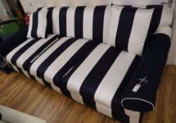 A large Ralph Lauren wide blue and white striped three seater settee L.250cm approx.