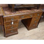 A Georgian style walnut pedestal desk W.120cm