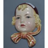 A Goldscheider pottery wall mask height 22cm