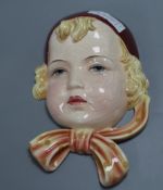 A Goldscheider pottery wall mask height 22cm