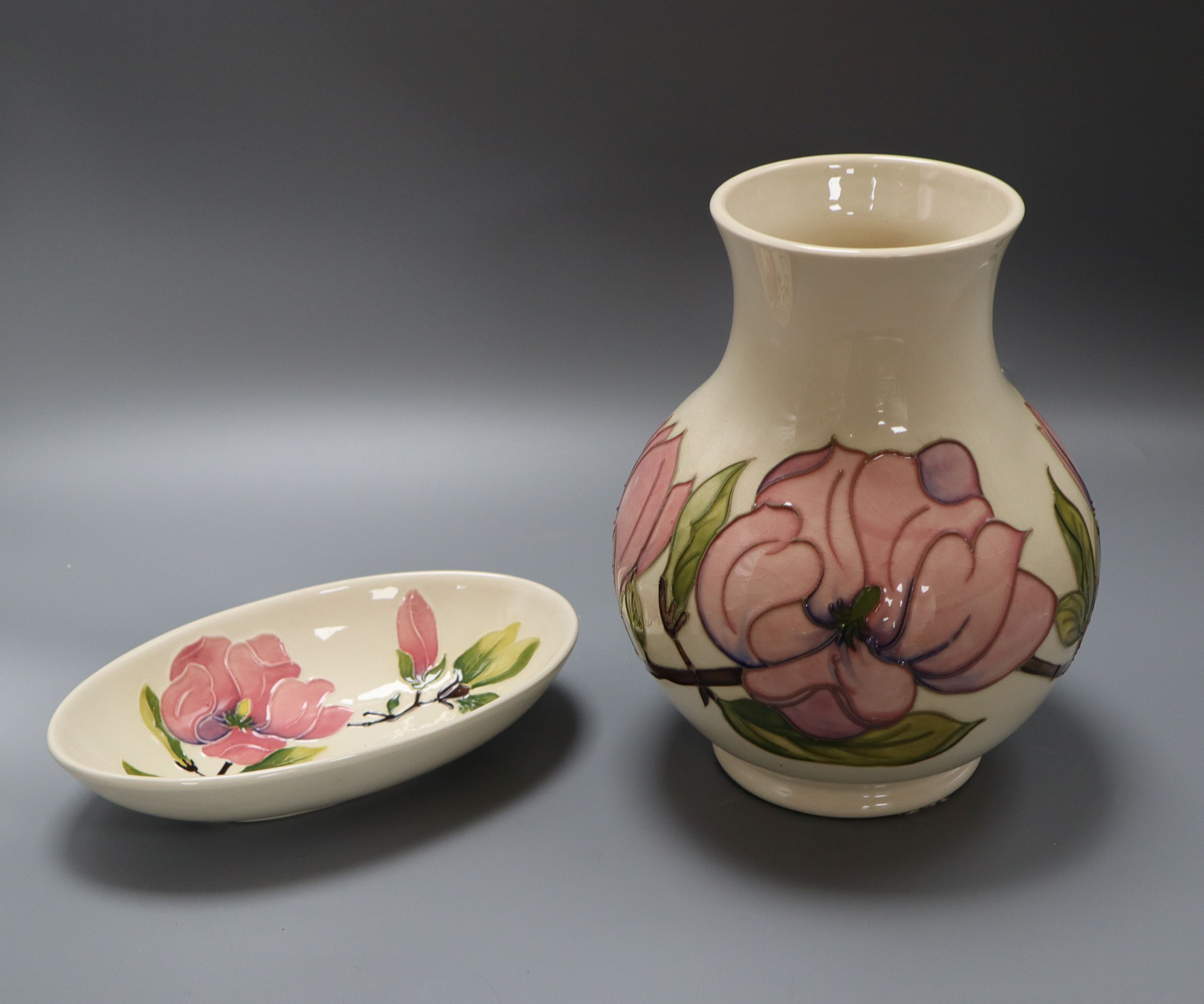 A Moorcroft magnolia baluster vase and an oval dish height 24cm