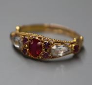 A Victorian 15ct gold, ruby, amethyst and rock crystal set dress ring, size M.