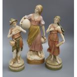 A Royal Dux figure of a girl carrying pitchers and pair of ditto (one a.f.) tallest 38cm
