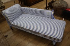 An Edwardian painted and blue and white upholstered chaise longue