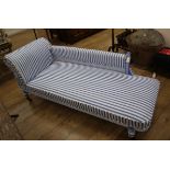 An Edwardian painted and blue and white upholstered chaise longue