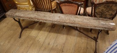 A 19th century provincial wood and cast iron bench L.184cm