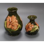 A Moorcroft hibiscus vase and similar squat vase tallest 19cm