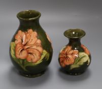 A Moorcroft hibiscus vase and similar squat vase tallest 19cm