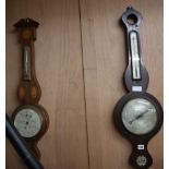 Two mahogany wheel barometers