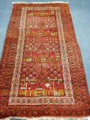 An Afghan rug 202 x 114cm