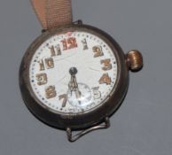 A gentleman's early 20th century white metal cased manual wind wrist watch, with Arabic dial and