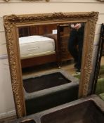 A moulded giltwood and gesso rectangular wall mirror 115 x 82cm