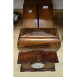 A rosewood 19th century tea caddy, mantel clock and oak stationery box