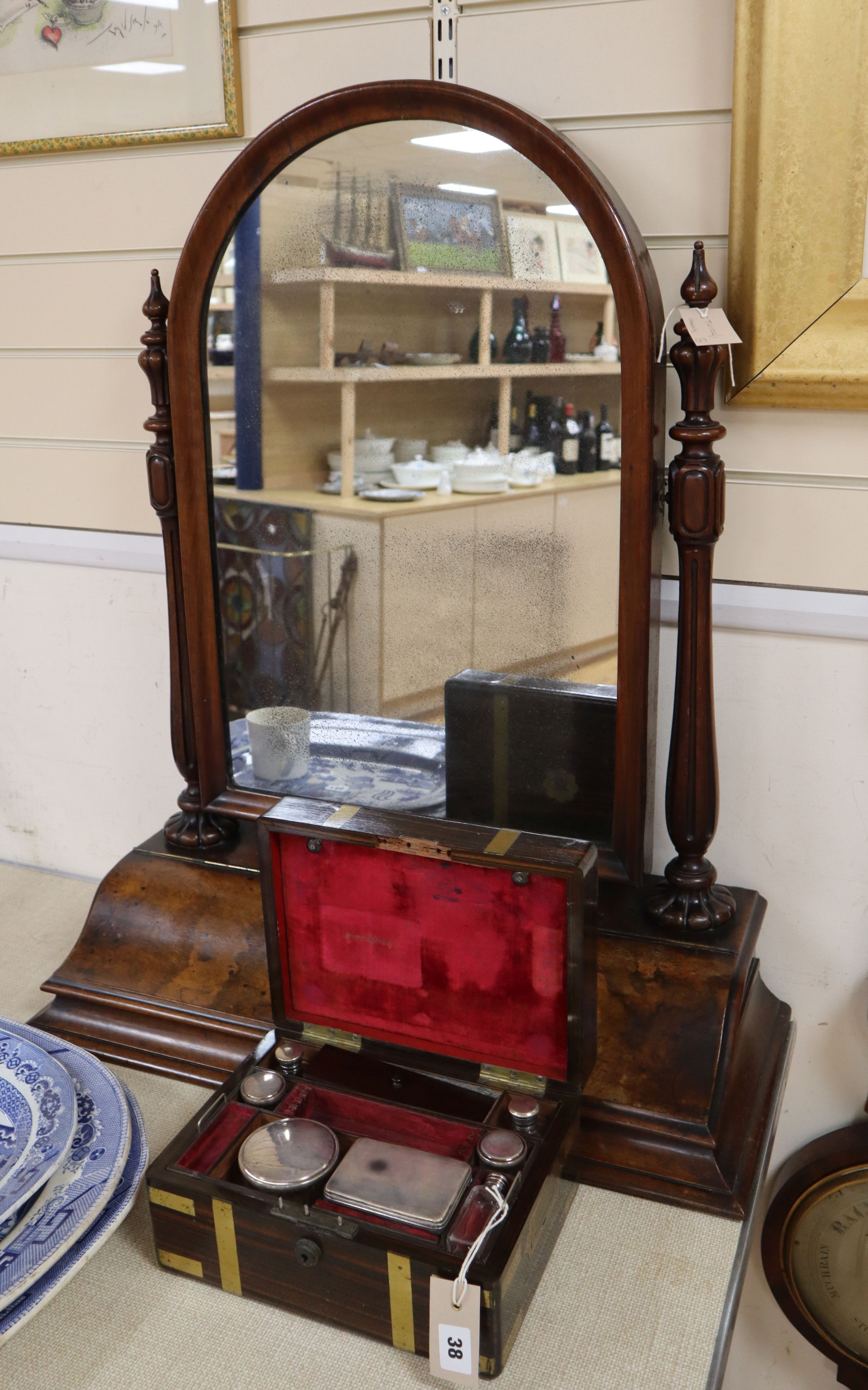 A Victorian walnut toilet mirror and a brass bound rosewood fitted toilet case width 28cm