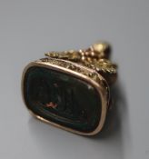 A 19th century two colour yellow metal and blood stone set fob seal, with fruiting vine