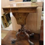 A Victorian figured walnut work table W.52cm