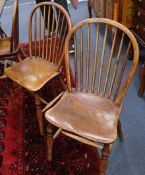 A harlequin set of eight 19th century Windsor comb back chairs