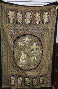 A Burmese large Kalaga sequinned wall hanging, profusely decorated with deities and dragons in