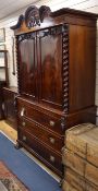 A mid 19th century Continental mahogany linen press W.126cm