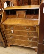 A George III style walnut bureau W.74cm