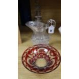 An early Victorian glass water jug, three Regency decanters and a Bohemian ruby glass bowl (5)