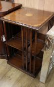 An Edwardian style inlaid mahogany revolving bookcase W.48cm