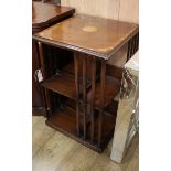 An Edwardian style inlaid mahogany revolving bookcase W.48cm