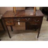 A 19th century mahogany kneehole side table W.96cm