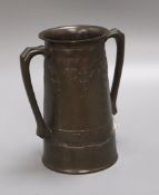 A Tudric pewter loving cup, designed by David Veasey for Liberty & Co, inscribed `For Old Times'