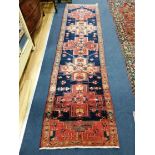 A Karajeh carpet 295 x 76cm