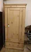 A Victorian pine single door wardrobe W.92cm