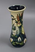 A Moorcroft Iris, Lily and Bulrushes vase height 21cm